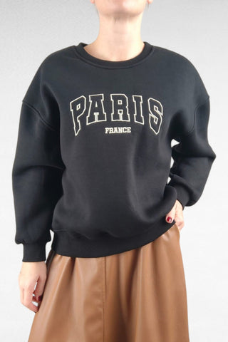 Felpa girocollo in tessuto felpato con stampa frontale "Paris". Perfetta per un look casual e confortevole, aggiunge un tocco di stile urbano.